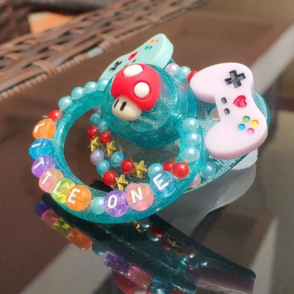 Teal Adult Nintendo Gaming Pacifier with Free Shipping and Secure Checkout - Cosparty