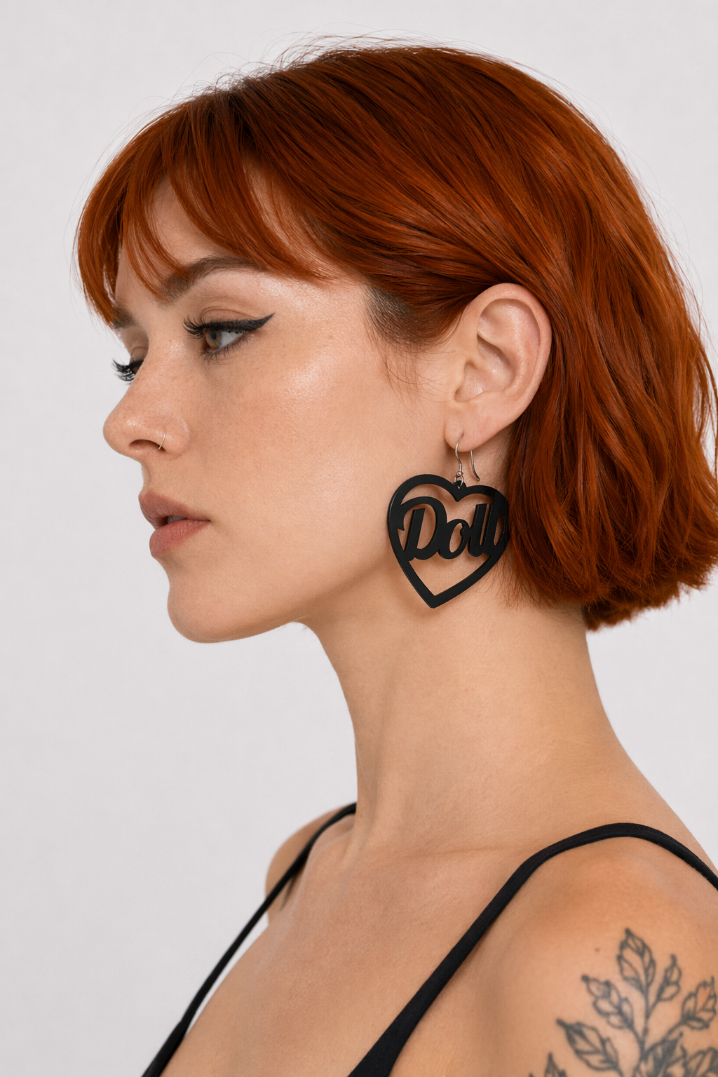 Glamorous Laser-Cut Heart Hoop Earrings in New Condition Black