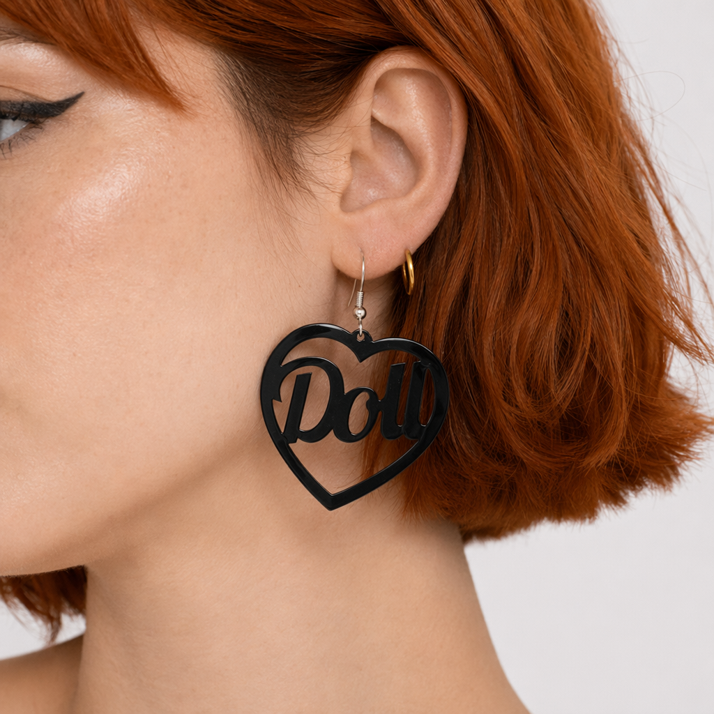 Glamorous Laser-Cut Heart Hoop Earrings in New Condition Black