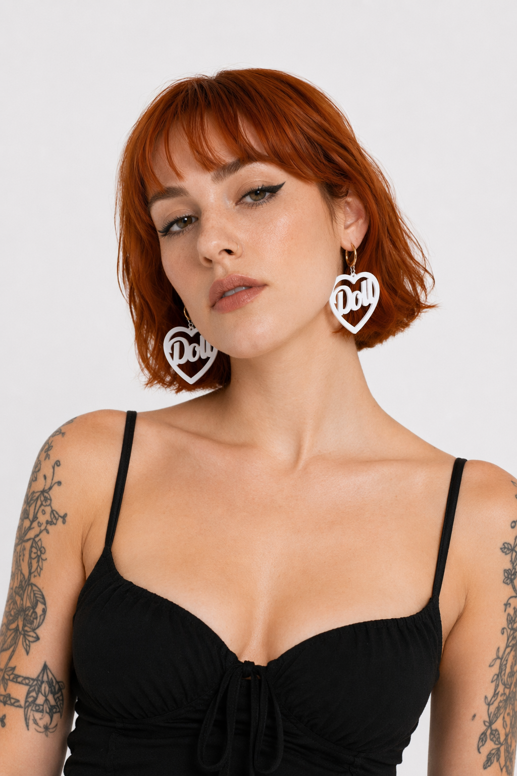 Glamorous Laser-Cut Heart Hoop Earrings in New Condition White