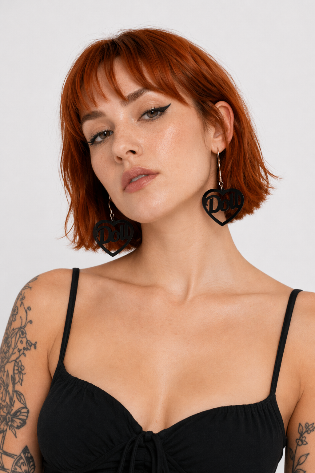 Glamorous Laser-Cut Heart Hoop Earrings in New Condition Black