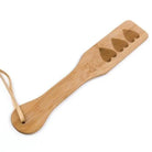 Bamboo Paddle with Heart Accents and Hanging Rope - paddle