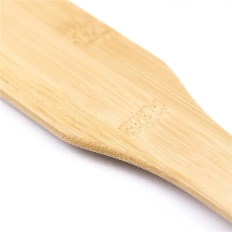 Bamboo Paddle with Heart Accents and Hanging Rope - paddle