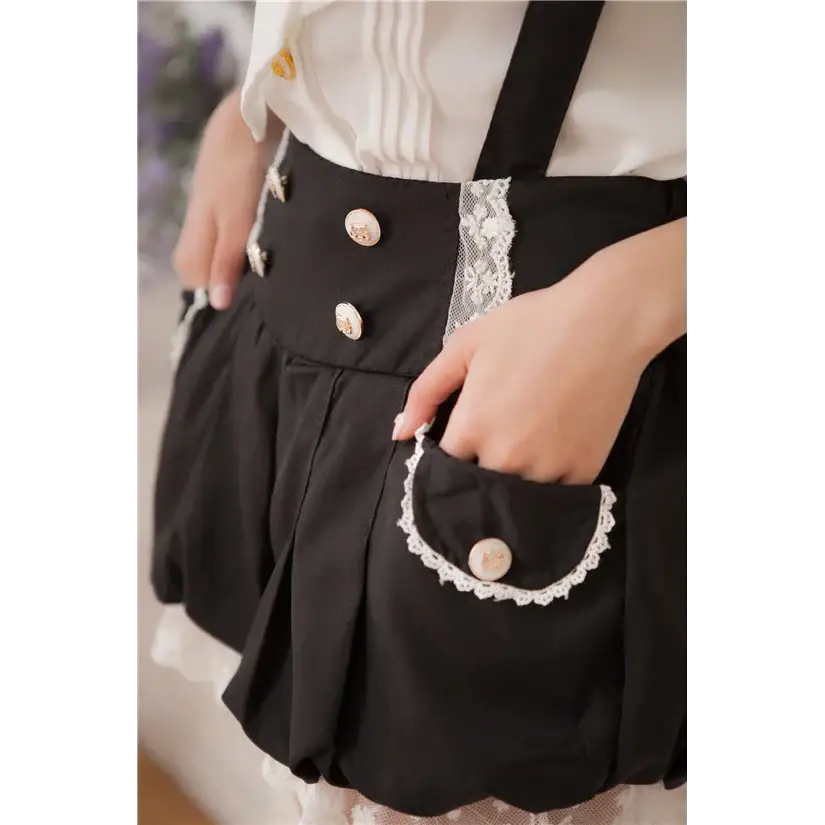 Black and White Bloomer-Style Shorts with Lace Ruffles and Pockets - Shorts