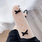 Kawaii Ribbon Embellished Fishnet Tights for Cosparties and Gothic Style - Cosparty