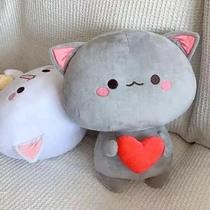 Peach & Goma Plushies.